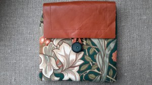 Leather flap purse made from William Morris design fabric 